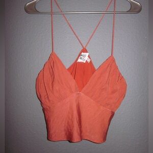 Spaghetti strap tank. Fits loose and comfortable